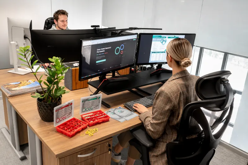 Kinetics Line team workstation with product documentation and gasket samples